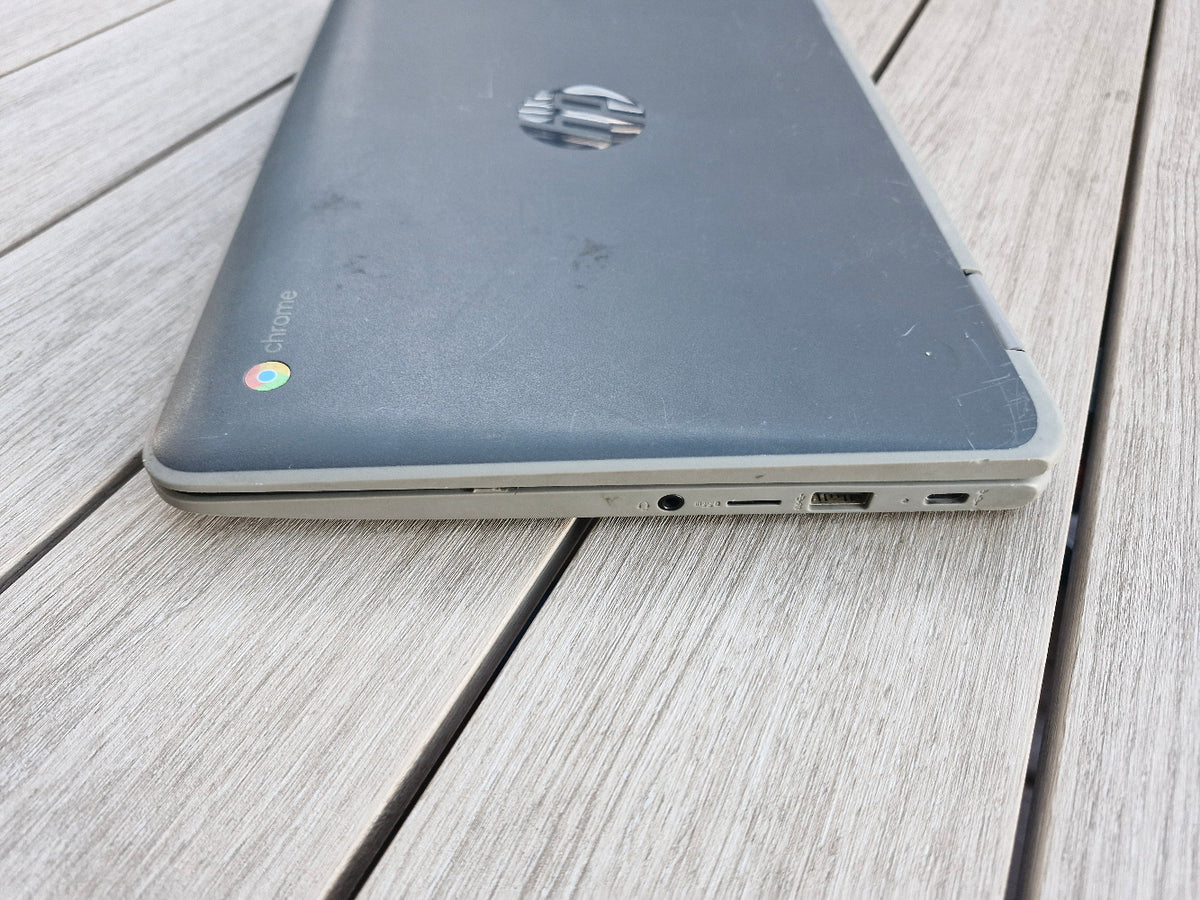HP x360 G2 EE 11 inch Chromebookon a wooden surface