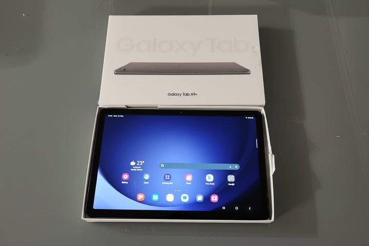 Samsung Galaxy Tab A9 p
Plus tablet with its packaging on a gray surface