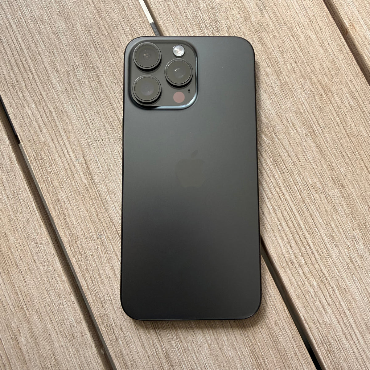 iPhone 16 Pro Max Black Titanium screen condition close-up