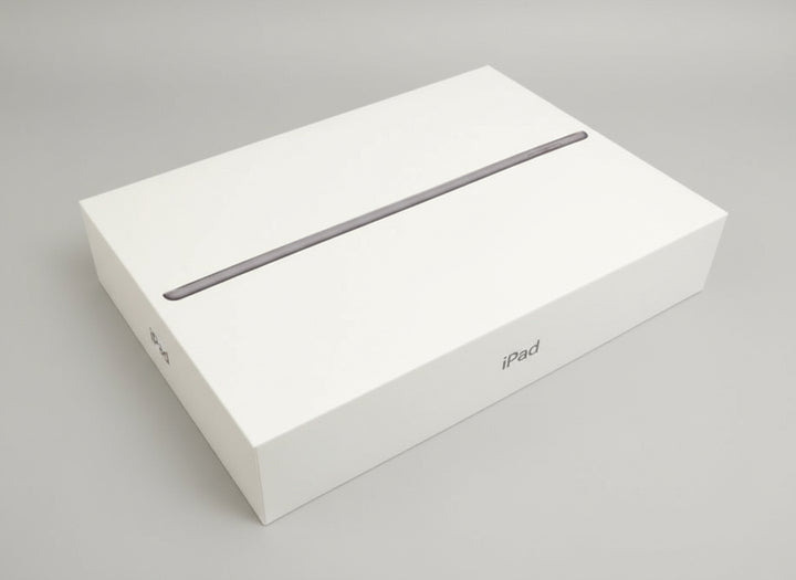 Apple iPad 7 32GB 10.2 inch Wi-Fi Rose Gold - Good Battery (As New)  White box with 'iPad' branding on a wooden surface